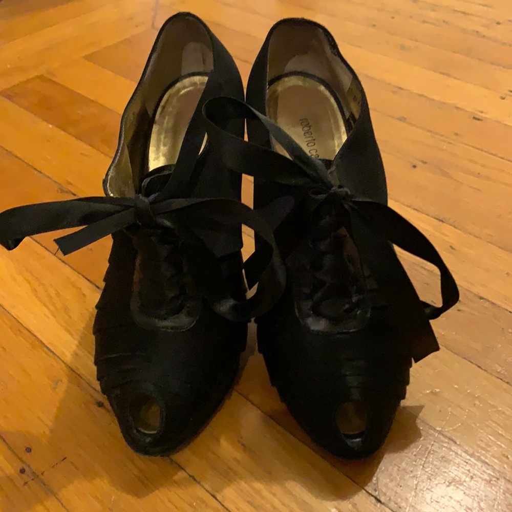 Like new Roberto Cavalli black ankle tie-up booties